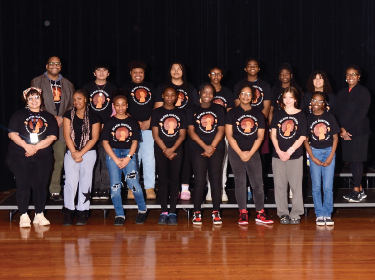 group of students standing in two lines